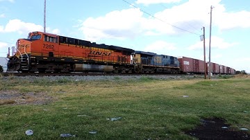 BNSF and CSX units lead a train through Arlington, TX!