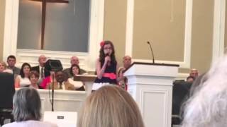Bailey singing her solo in church Easter Sunday