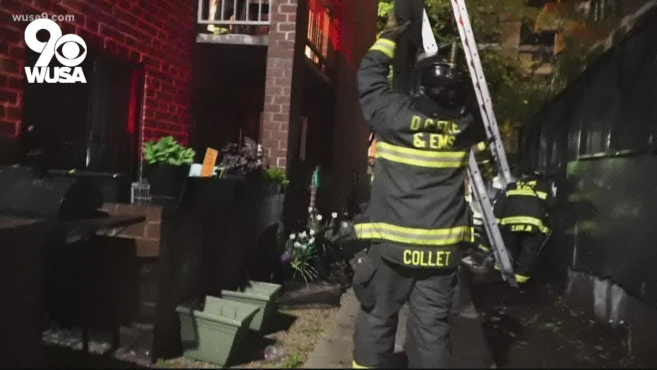 DC firefighters rescue several people from apartment fire - YouTube