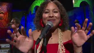 Robin Barnes performs "Celebrate Around the World" on the News With a Twist Stage