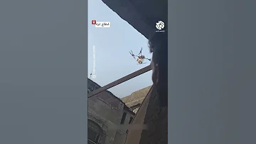 شاهد مسي رة إسرائيلية تلقي المتفجرات على المنازل في مدينة غزة 