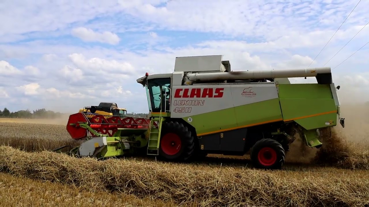 Claas Lexion 450 plus New Holland CX 8060 im Weizen.