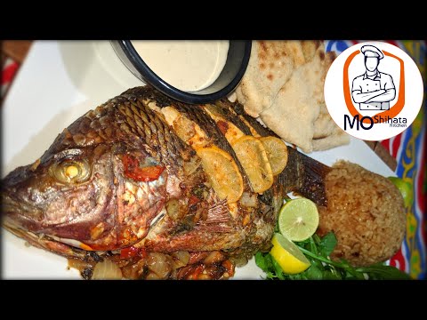 السمك المشوي فى الفرن بالزيت والليمون والخلطة السحرية 