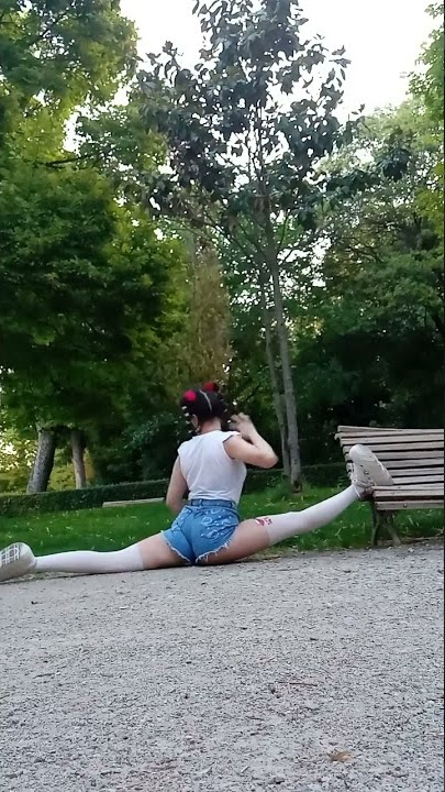 Oversplit in the park. Flexibility. Contorsionism.