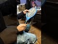 Person Tests Electric Swatter, Gets Shocked, Smashes Chair