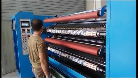 Automatic paper core loading slitting machine