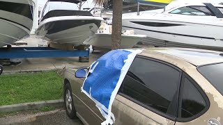 Thief breaks into a half dozen cars at boat dealer parking lot
