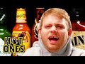 Mac demarco tries to stay chill while eating spicy wings  hot ones