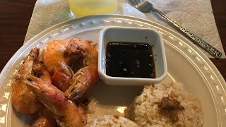 Spicy garlic butter shrimp with fried rice and kalamunding juice