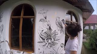 Painting on the facade of the restaurant. Graphic flowers Wallpainting brend.mira