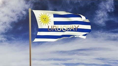 4K Uruguay flag with title waving in the wind. Looping sun rises style. Animation loop Stock video
