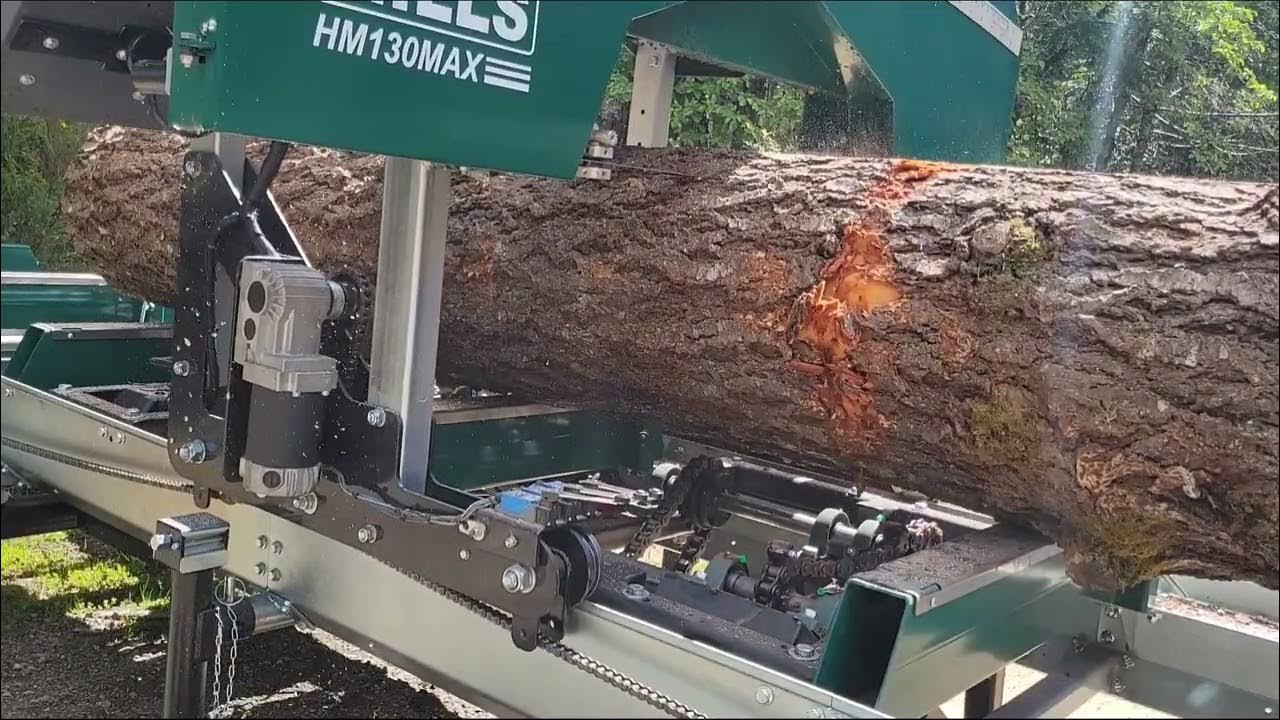 Woodland mills HM130MAX with a winch log turner/milling logs for a