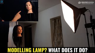 What is the Purpose of a Modeling Lamp in Studio Photography?
