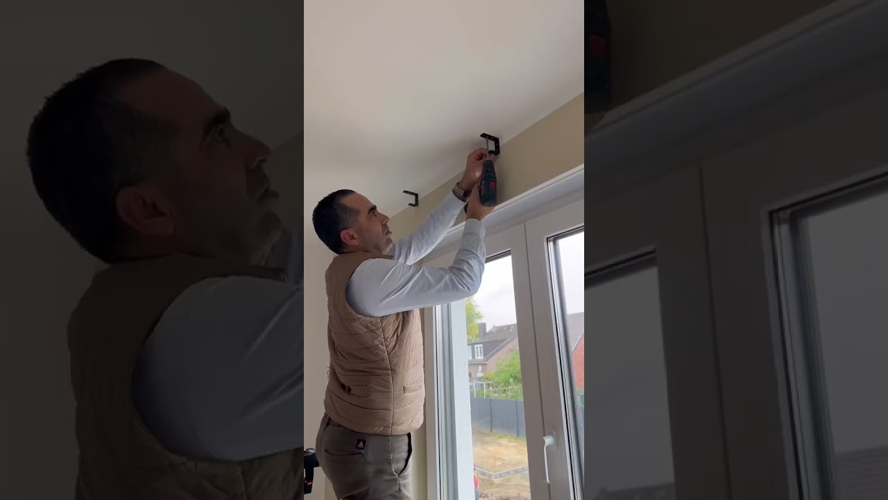 Black wooden blinds installation in Dubai 