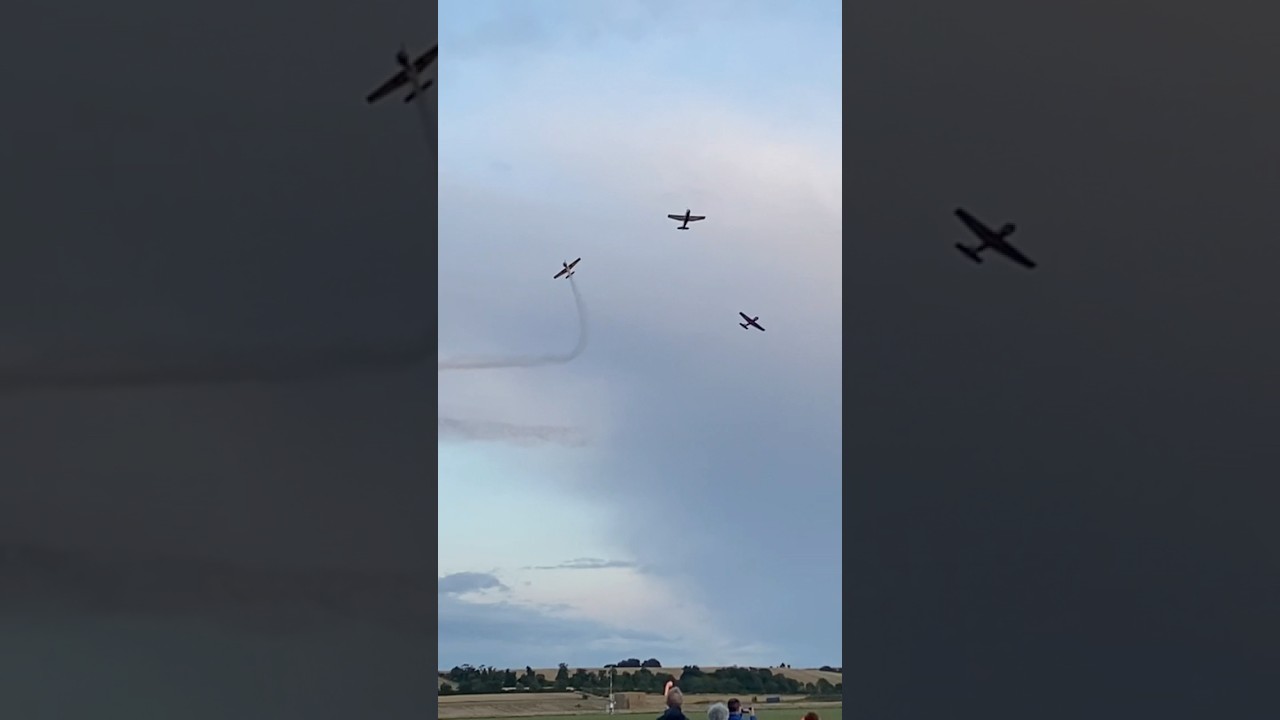 IWM Duxford flying evening Airshow 2023 Flying Comrades Yakovlev Yak-18 Yak-52 at the crowd break