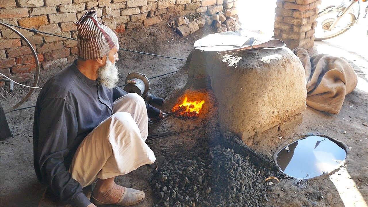 Hand Forging a War Axe Out of Rusted IRON - YouTube