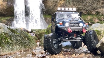 Toyota MST CFX-W J45C crawling at a huge waterfall