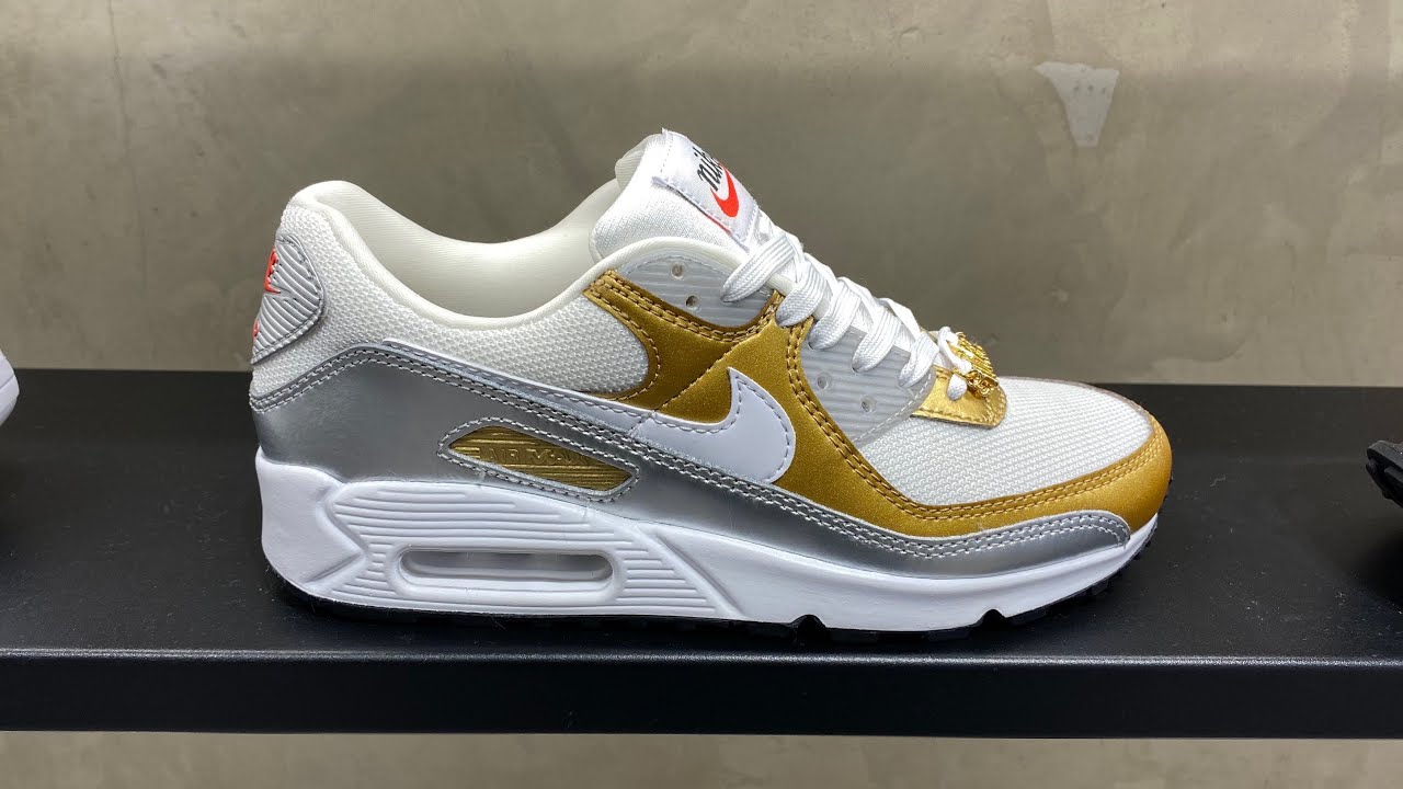 white air max gold tick