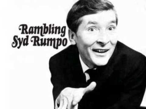 KENNETH WILLIAMS as RAMBLING SYD RUMPO - In Concer...