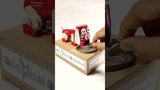Dog that Eats Coins From Cardboard And Coca-Cola Cans