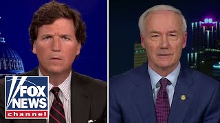 Tucker clashes with Arkansas governor over youth gender reassignment bill