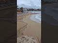 #DreamTrackAI wet an wild corallia beach storm is passing sun breaks through