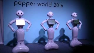 Pepper of 3 humanoid robots dance and sing.