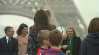 William and Kate play rugby in front of Eiffel Tower