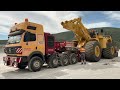 Transportation of huge wheel loader bulldozer and excavators  mega machines movie