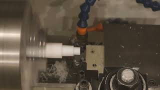 Dyna Myte DM3000 CNC lathe with Acorn controller making Teflon plugs