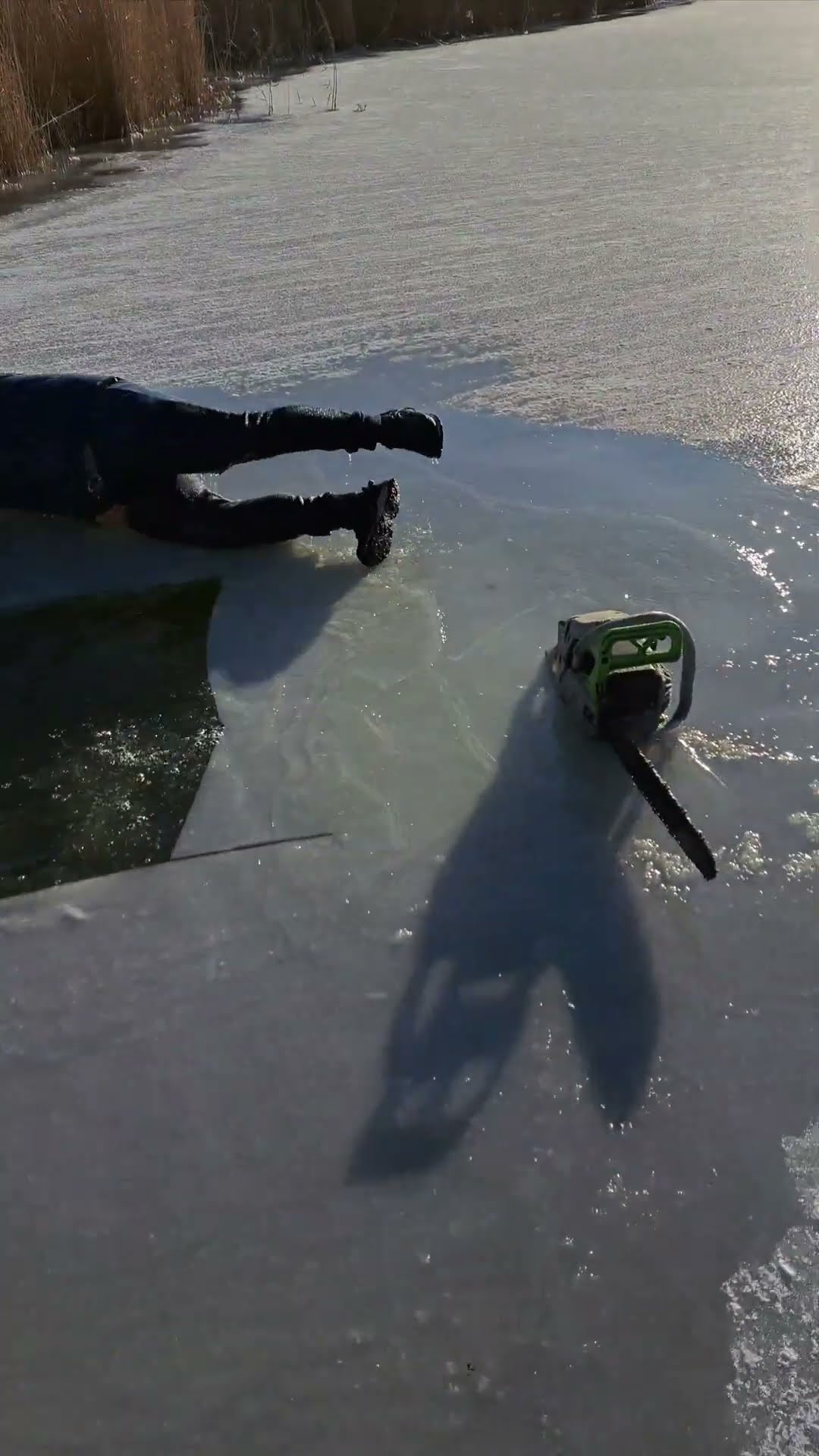 Ice Breaks Around Chainsaw || ViralHog