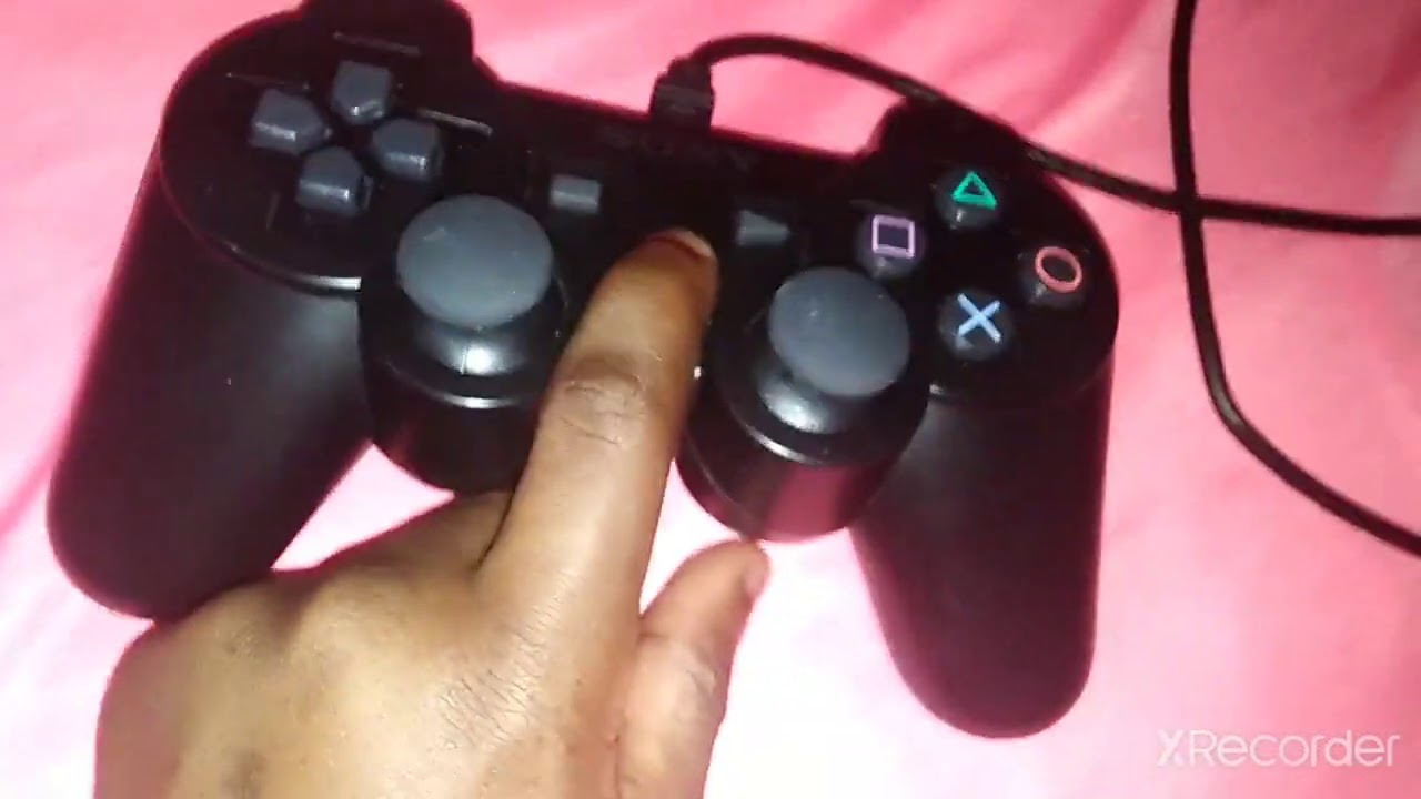 Comment brancher sa manette ps3 a sont portable - YouTube