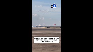 Flames erupt as NASA plane touches down without landing gear
