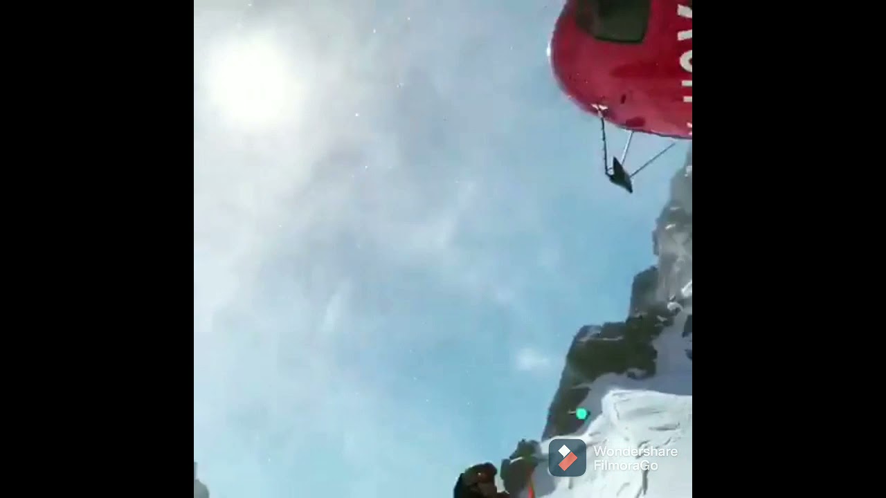 Airbus AS35B3 Helicopter Backward Takeoff from snow helipad 