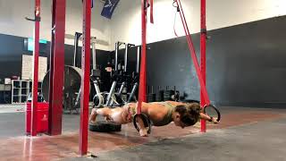 Feet Elevated Ring Archer Pushups