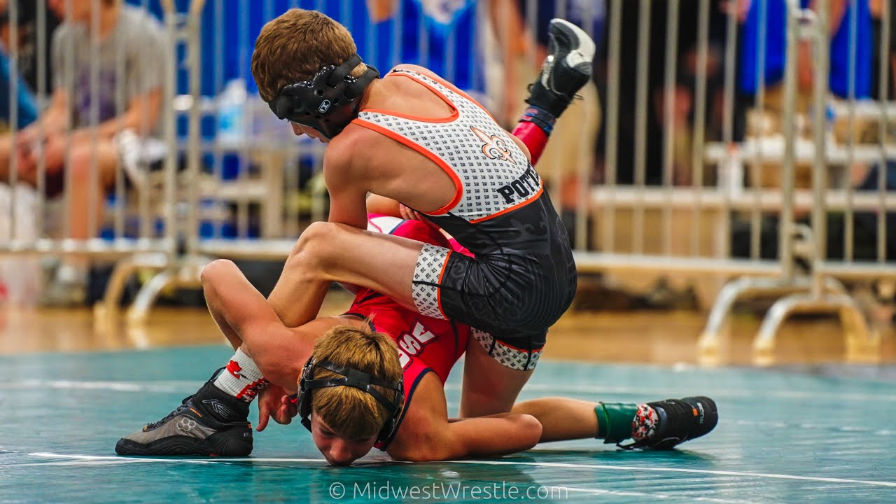 74 12U – Kaden Potter {G} of St  Charles IL vs. Tanner Stone {R} of Illinois Gladiators