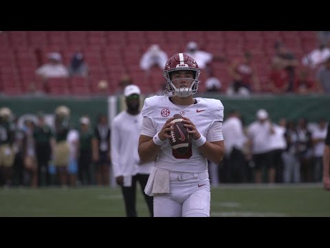 Tyler Buchner warms up for his first start as Alabama's quarterback