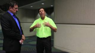 Jeff Rude gets swing tip from instructor Jay Golden