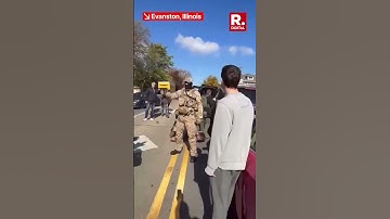 ICE Agent Caught Pointing Gun At Unarmed Civilians