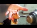 Spin Top on top of finger- Woodturning by Eli Avisera