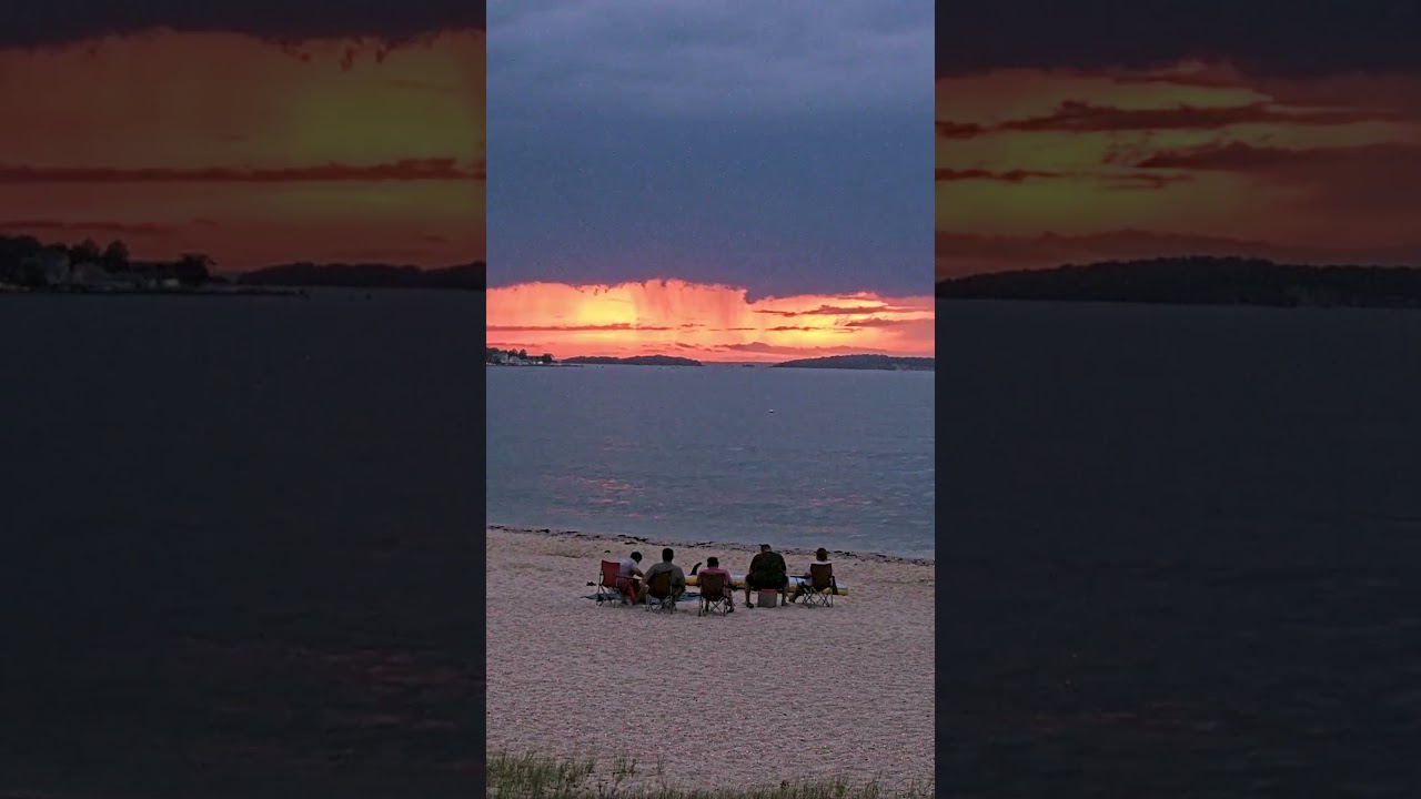 Hamptons.com Beachgoer's watching storm rolling in (Fosters Beach, Sag Harbor)