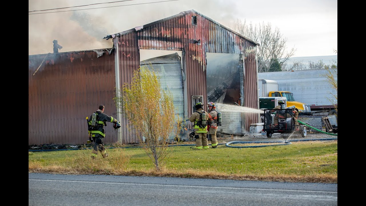 Fire fighters work to put out fire in Finley YouTube
