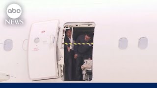 Passenger arrested for opening emergency exit door 850 feet in the air l GMA