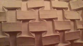 Origami exploding brick wall  by Yoshide Momotani