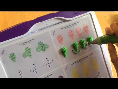 Cake Decorating Piping Techniques: How to Make a Plume ...
