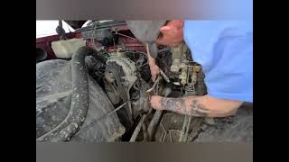 Spark Plugs, Plug Wires, Distributor Cap, Rotor Button and Fuel Filter on a 1991 GMC 1500