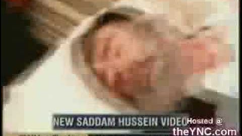 Footage of Saddam Hussein laying on the stretcher after being executed!