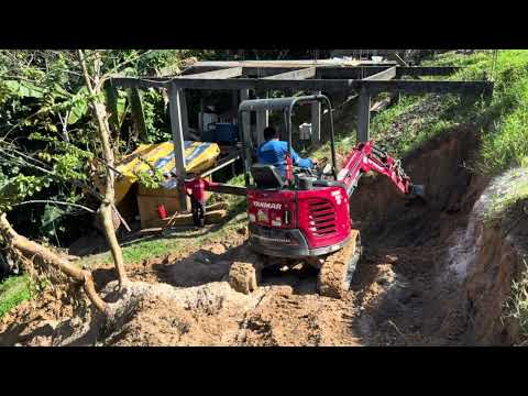 HAD TO USE A BOOM TRUCK TO UNLOAD THE MINI EXCAVATOR