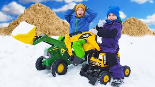 John Deere Tractor stuck in the snow - JCB excavator cleared the road