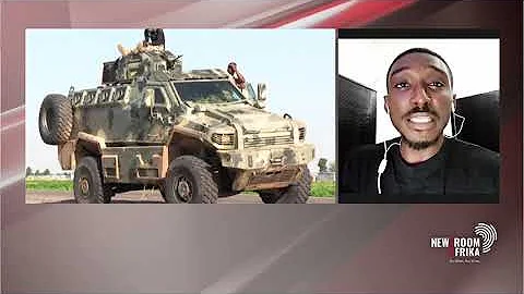 Boko Haram fighters hoist the Islamist group's flag in a remote district in Niger State, Nigeria.